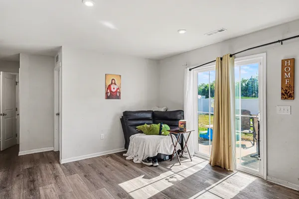 a living room with a couch and a table