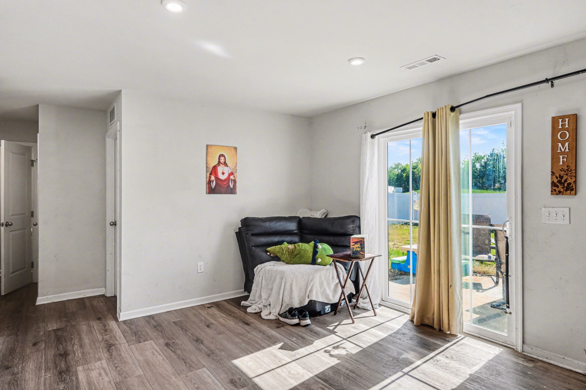 5778 Stardive Way Christiana, TN 37037 - Photo 12 of 29 a living room with a couch and a table