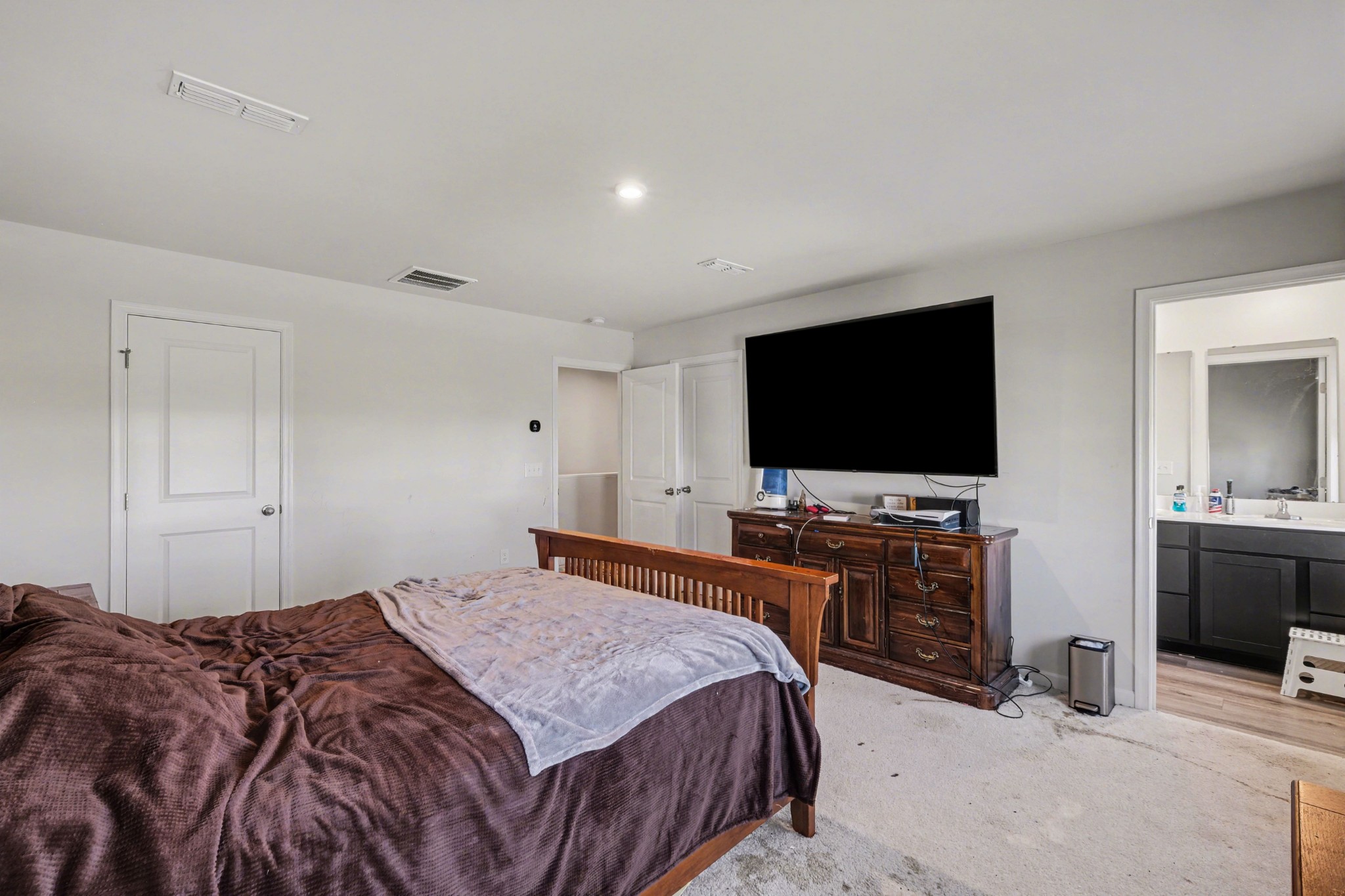 5778 Stardive Way Christiana, TN 37037 - Photo 15 of 29 a bedroom with a bed and a flat screen tv