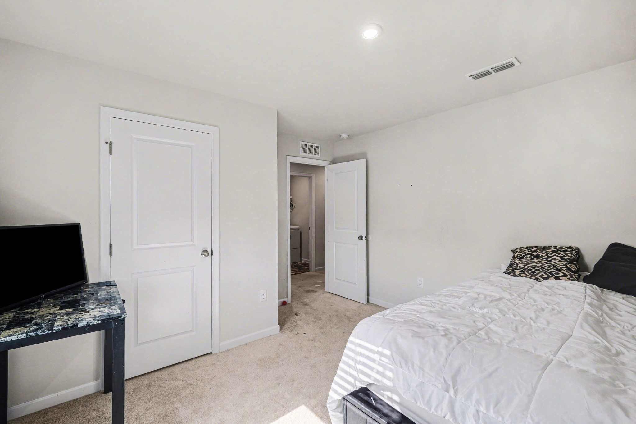 5778 Stardive Way Christiana, TN 37037 - Photo 22 of 29 a bedroom with a bed and a flat screen tv