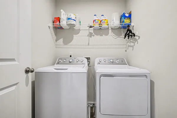 a utility room with dryer and washer