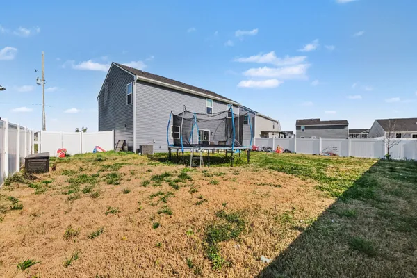 a house view with a outdoor space