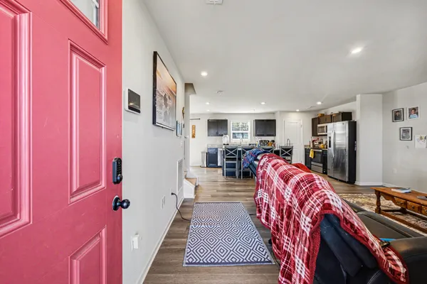 a bed room with a bed and a flat screen tv