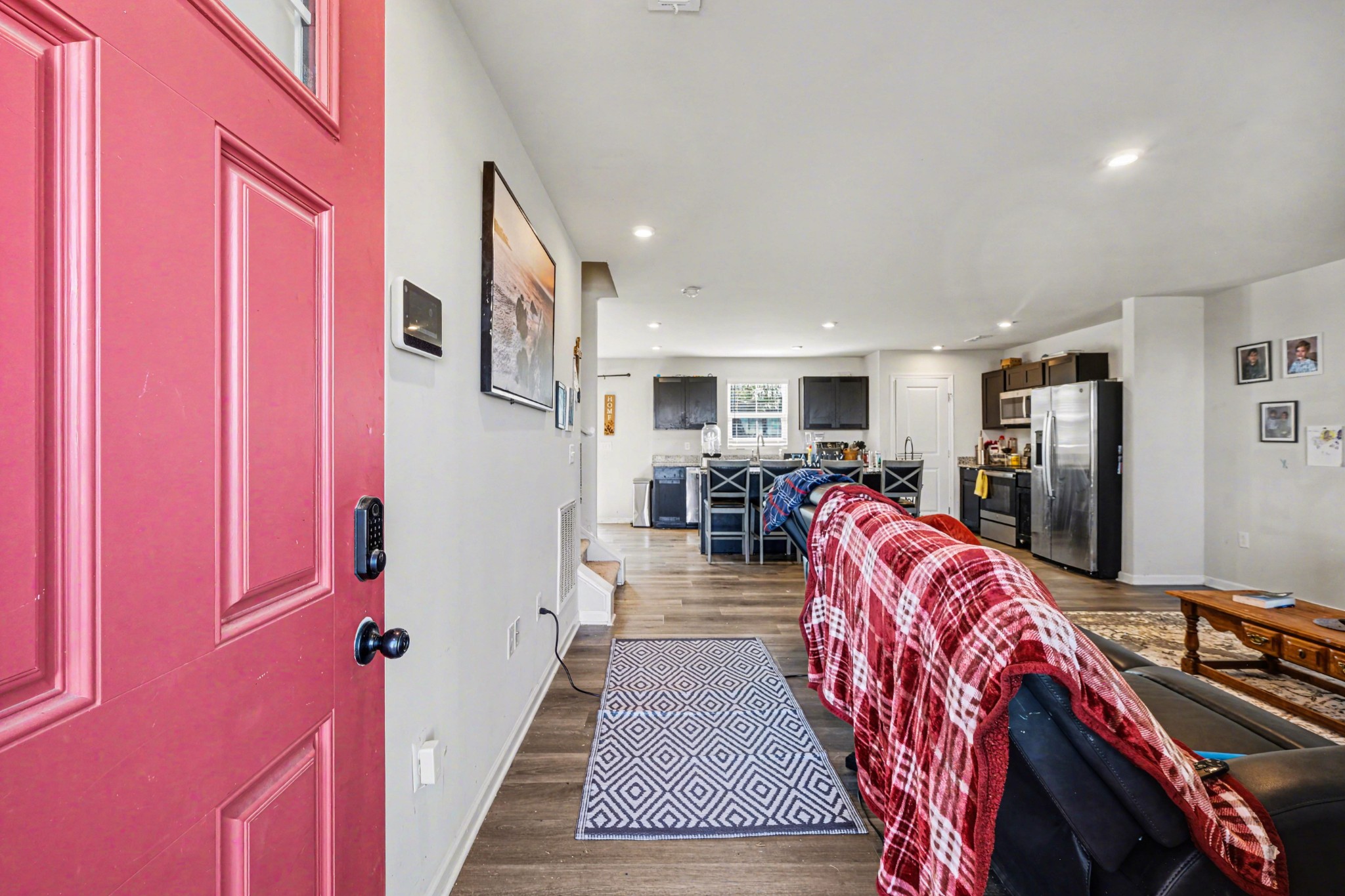 5778 Stardive Way Christiana, TN 37037 - Photo 4 of 29 a bed room with a bed and a flat screen tv