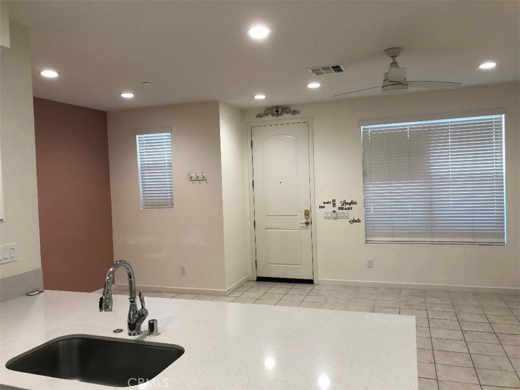 211 Red Brick Drive, Unit 3 Simi Valley, CA 93065 - Photo 4 of 13 a bathroom with a sink and a mirror