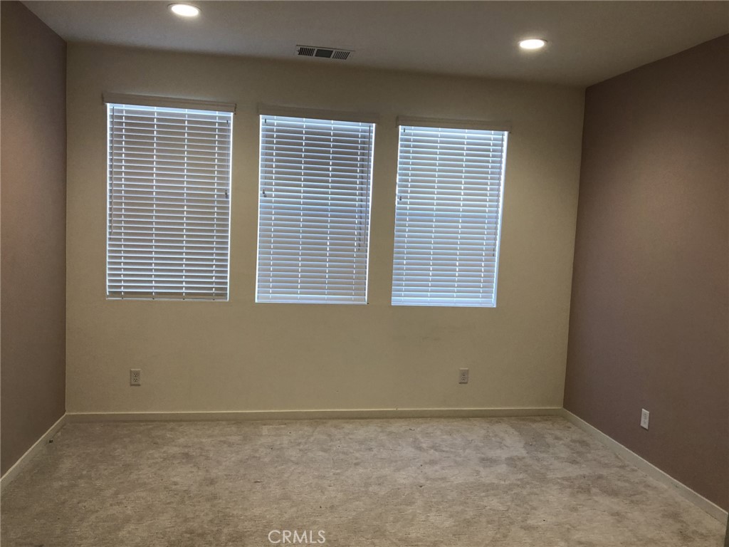 211 Red Brick Drive, Unit 3 Simi Valley, CA 93065 - Photo 6 of 13 a view of an empty room with a window