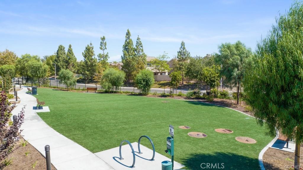 211 Red Brick Drive, Unit 3 Simi Valley, CA 93065 - Photo 9 of 13 a view of a golf course with a garden