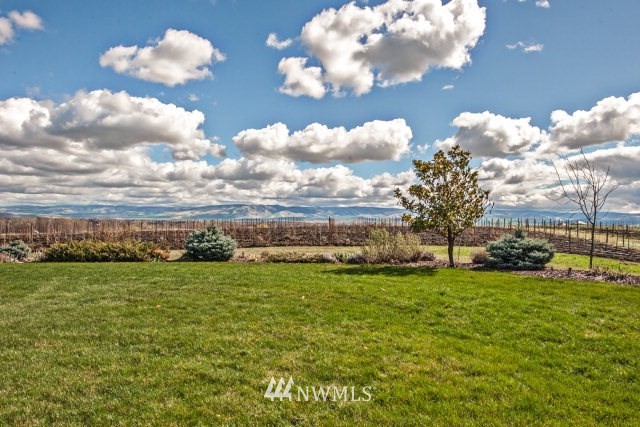 0 Cross Creek Road Walla Walla, WA 99362 - Photo 1 of 1 a view of a big yard with table and chairs and a large tree