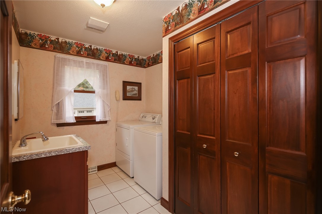 215 Georgetown-Damascus Road Beloit, OH 44609 - Photo 15 of 37 First floor Laundry room and half bath