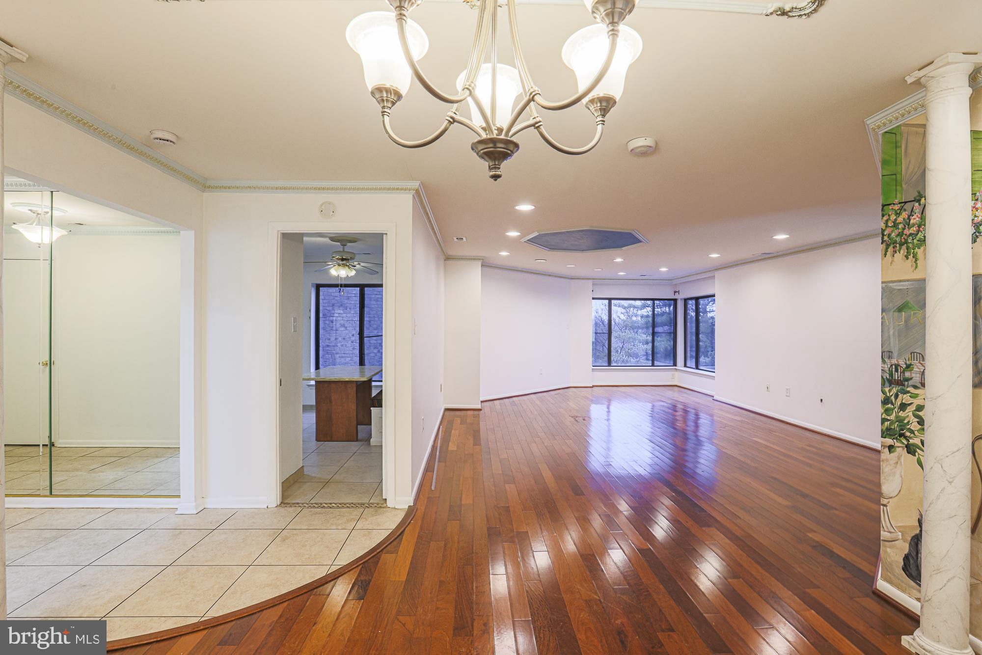 3041 Fallstaff Road, Unit 405D Baltimore, MD 21209 - Photo 15 of 38 a view of an entryway with wooden floor