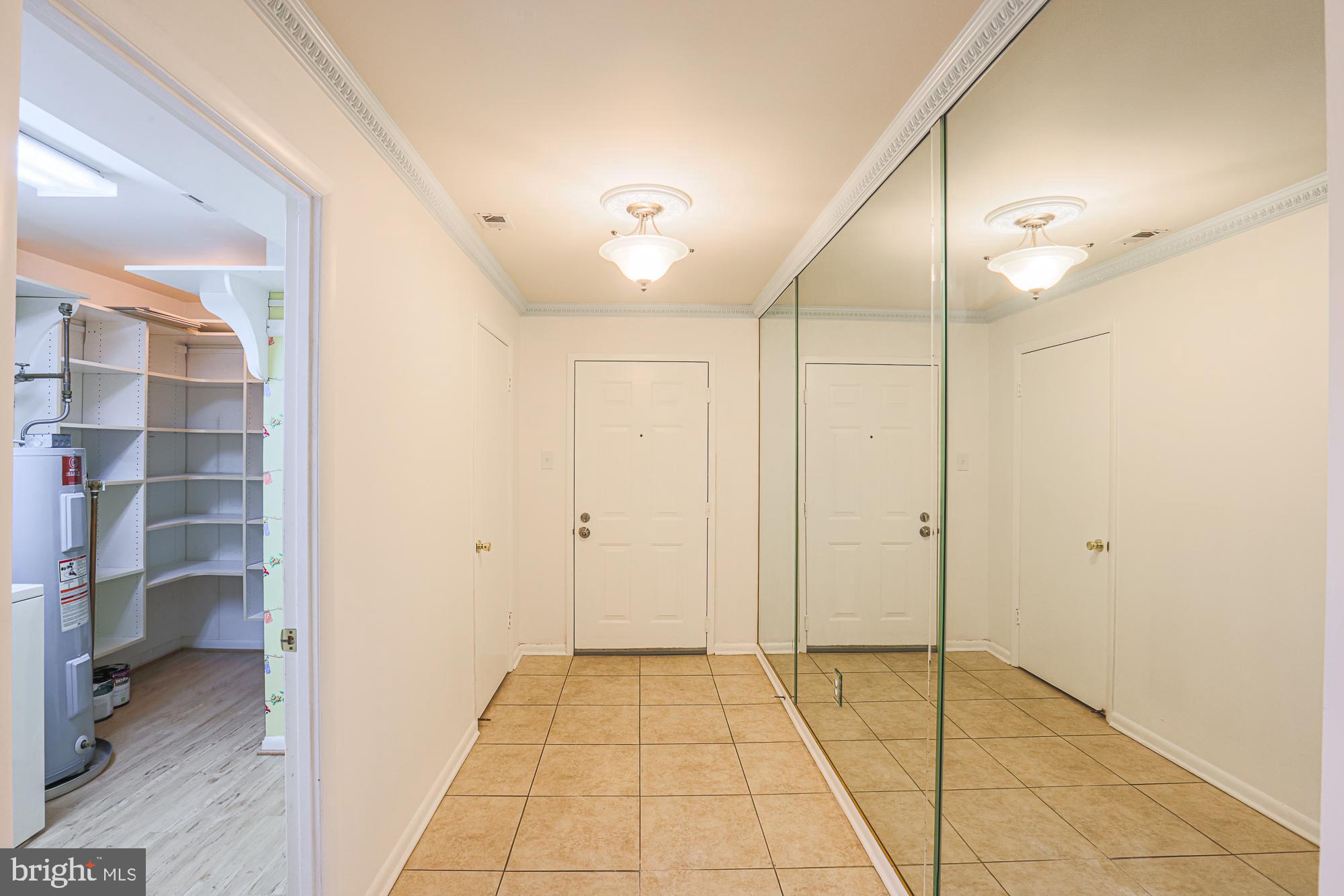 3041 Fallstaff Road, Unit 405D Baltimore, MD 21209 - Photo 16 of 38 a view of a bathroom with a shower