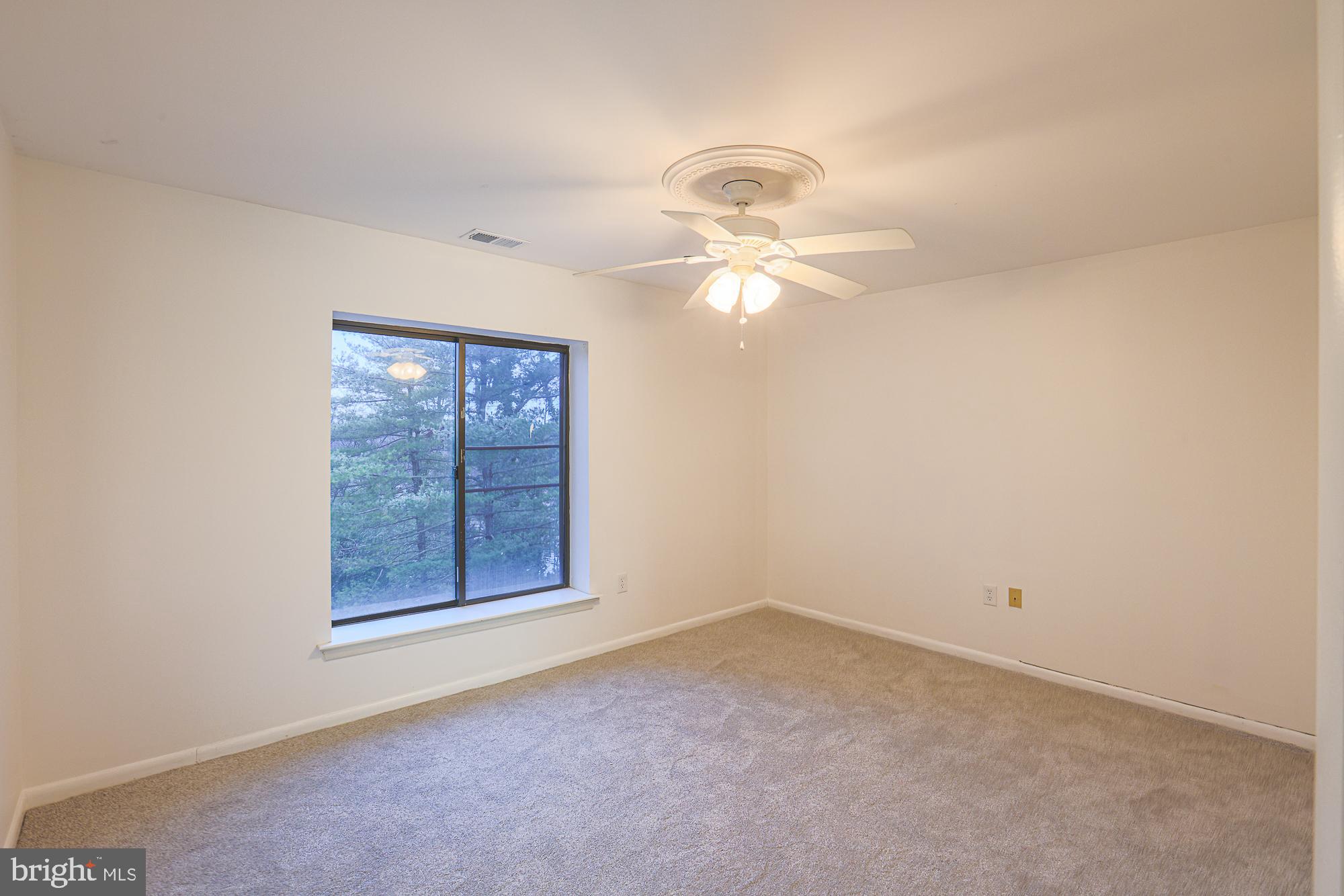 3041 Fallstaff Road, Unit 405D Baltimore, MD 21209 - Photo 24 of 38 an empty room with a window