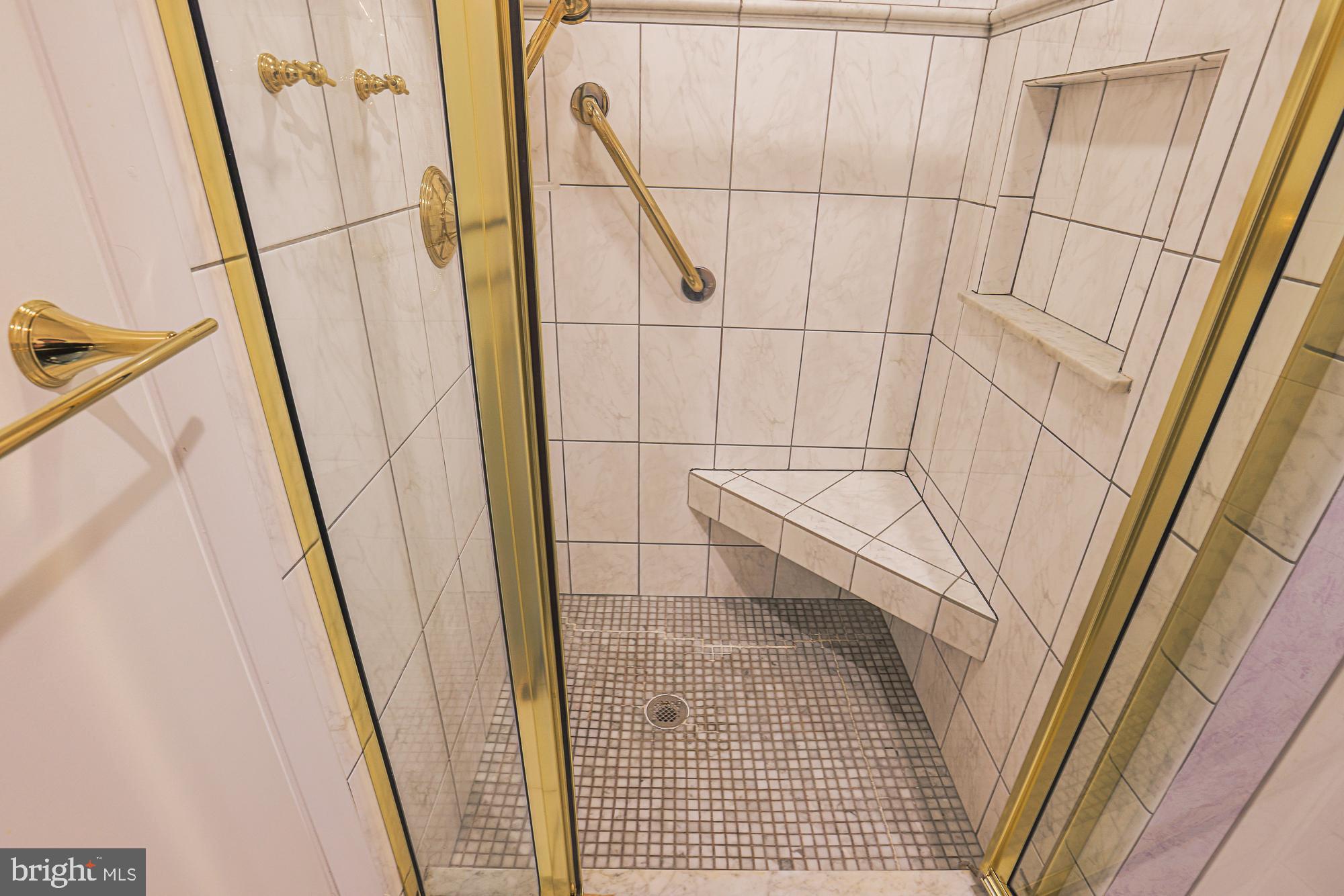 3041 Fallstaff Road, Unit 405D Baltimore, MD 21209 - Photo 29 of 38 a bathroom with a sink and a shower