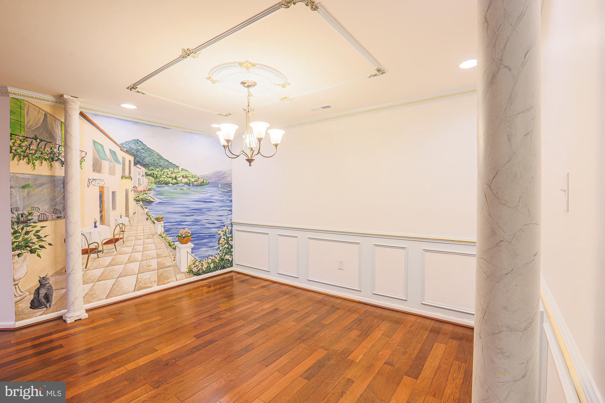 3041 Fallstaff Road, Unit 405D Baltimore, MD 21209 - Photo 9 of 38 a view of a livingroom with wooden floor