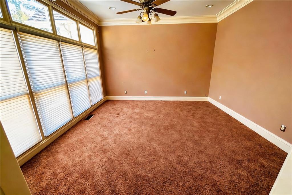 3930 Demooney Road Atlanta, GA 30349 - Photo 19 of 36 a view of an empty room and a window