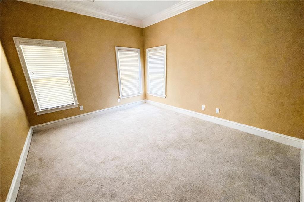 3930 Demooney Road Atlanta, GA 30349 - Photo 20 of 36 an empty room with windows