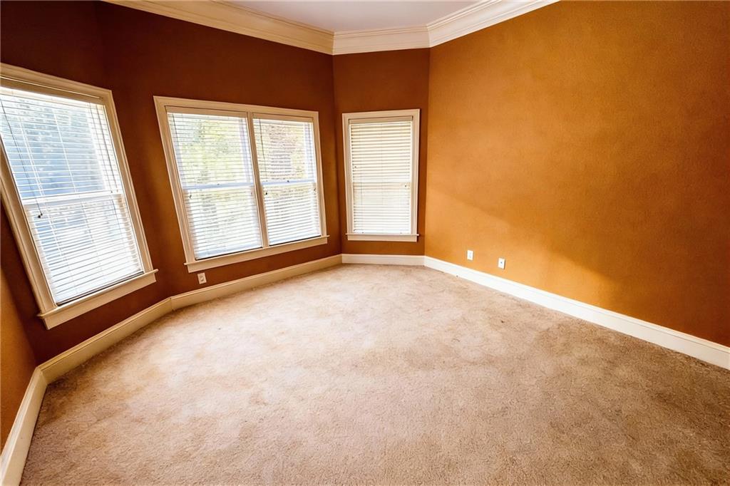 3930 Demooney Road Atlanta, GA 30349 - Photo 21 of 36 a view of an empty room with a window