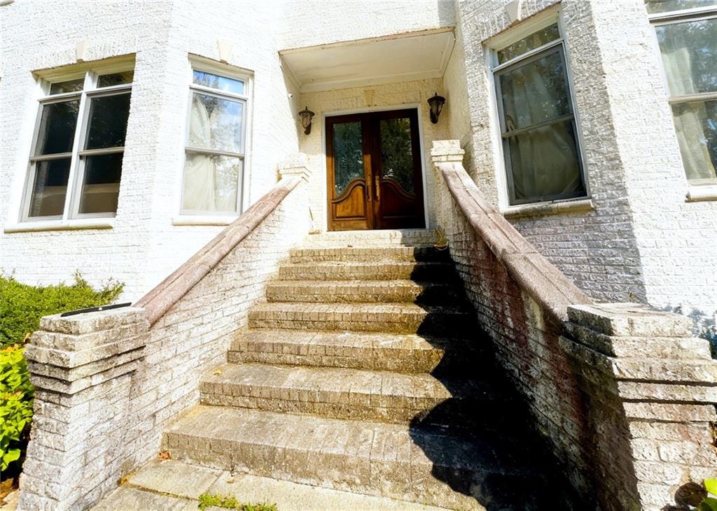 3930 Demooney Road Atlanta, GA 30349 - Photo 9 of 36 a view of entryway with a front door