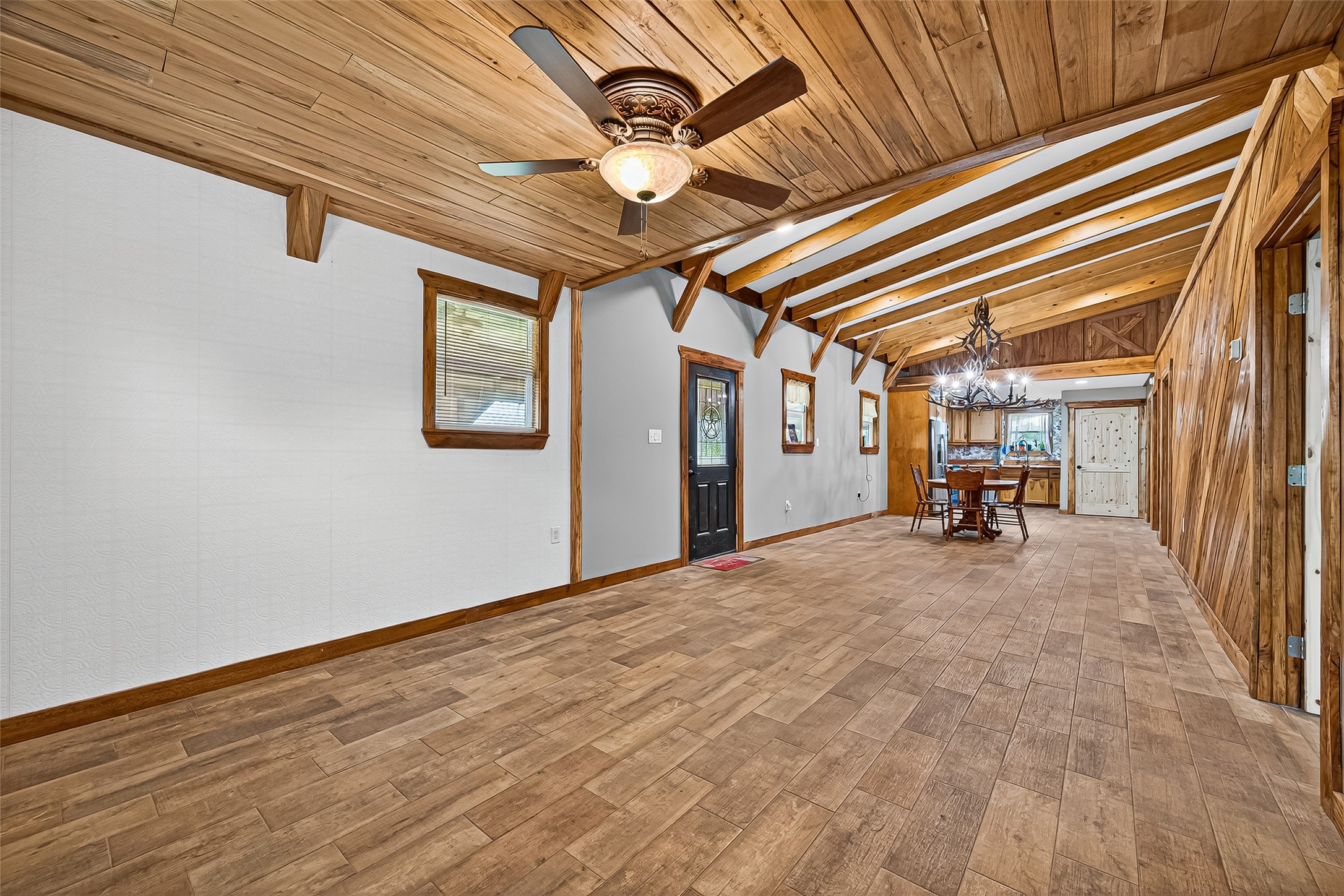 2080 Ave J Street Boling, TX 77420 - Photo 11 of 50 a view of a livingroom with wooden floor and furniture
