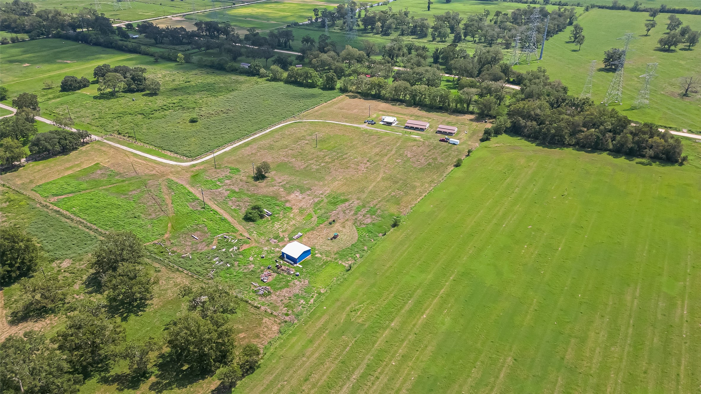 2080 Ave J Street Boling, TX 77420 - Photo 3 of 50 an aerial view of a house