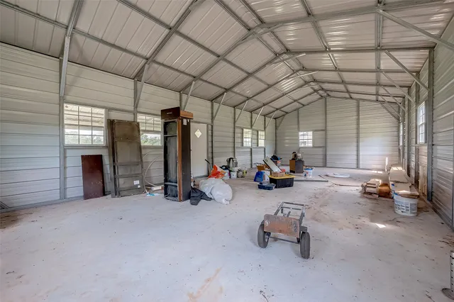 a view of a garage with furniture