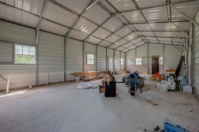 a house view with a play ground in front of it