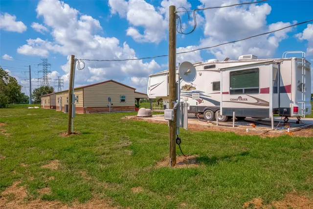 a view of a big yard of a house with a big yard