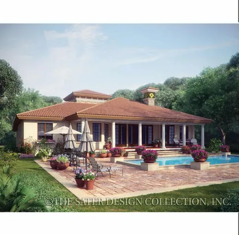 a front view of a house with a garden and plants