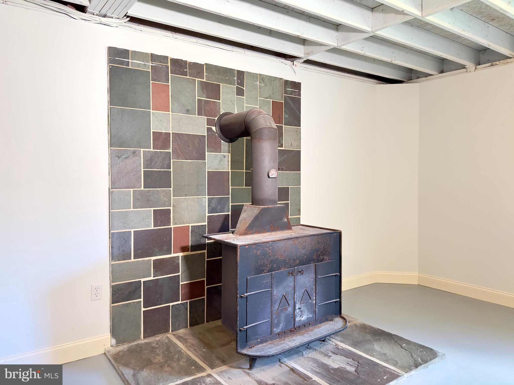 124 Engletown Road Honey Brook, PA 19344 - Photo 42 of 72 Woodstove to help keep heating bills in check.