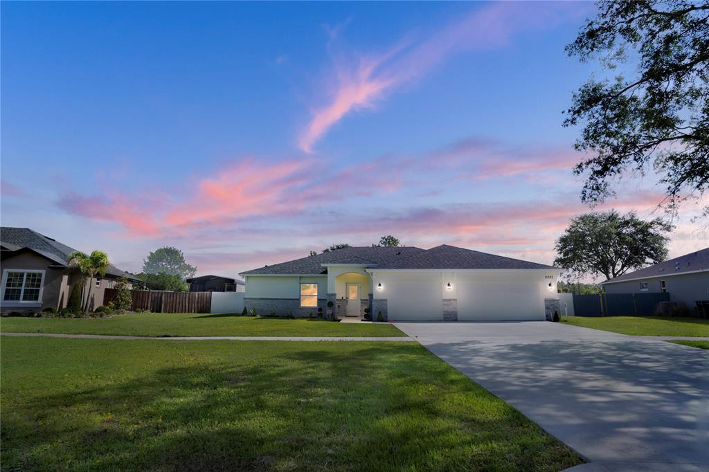 2201 Abalone Boulevard Orlando, FL 32833 - Photo 18 of 32 a view of house with a garden