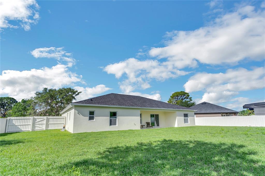 2201 Abalone Boulevard Orlando, FL 32833 - Photo 29 of 32 a front view of a house with yard