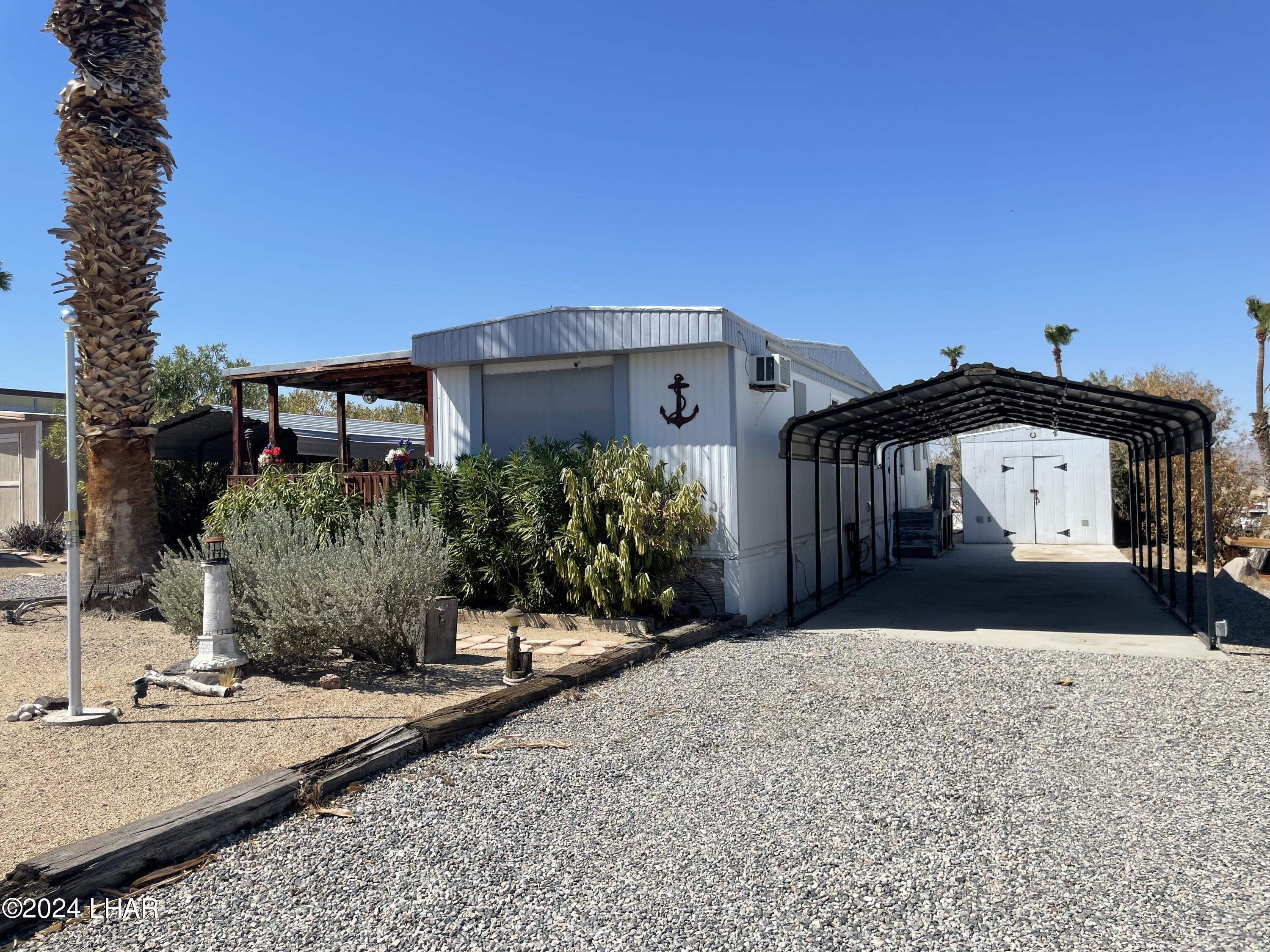 4006 London Bridge Road, Unit 129 Lake Havasu City, AZ 86404 - Photo 16 of 20 Second Carport
