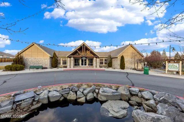 a view of multiple house with a street