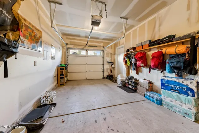 a view of a backyard with sitting area