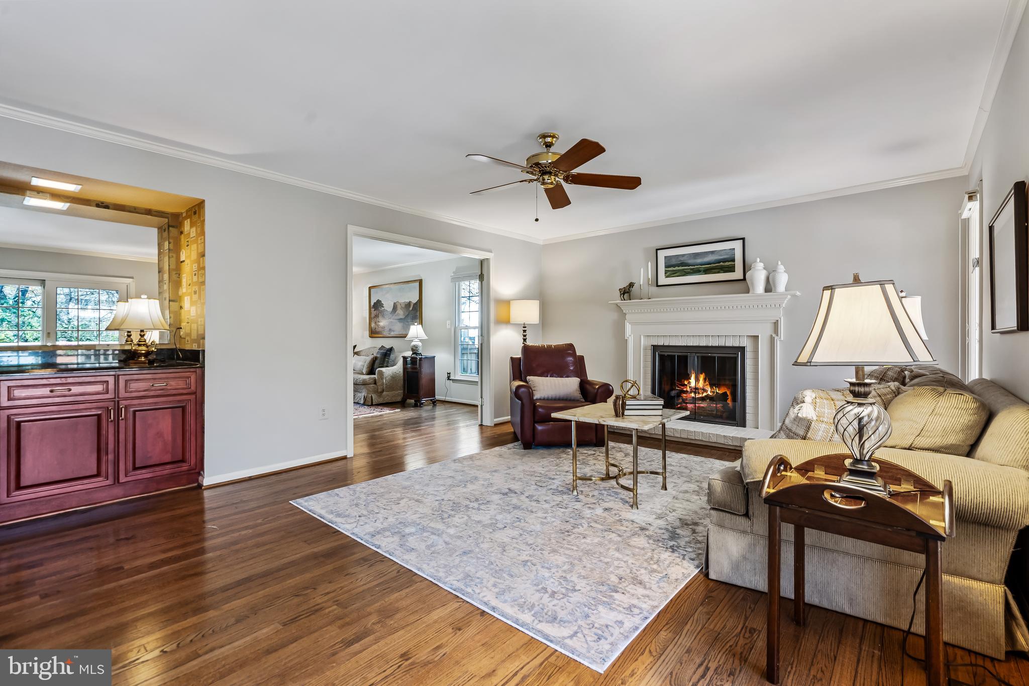 2716 Glencroft Road Vienna, VA 22181 - Photo 11 of 66 a living room with furniture and a fireplace