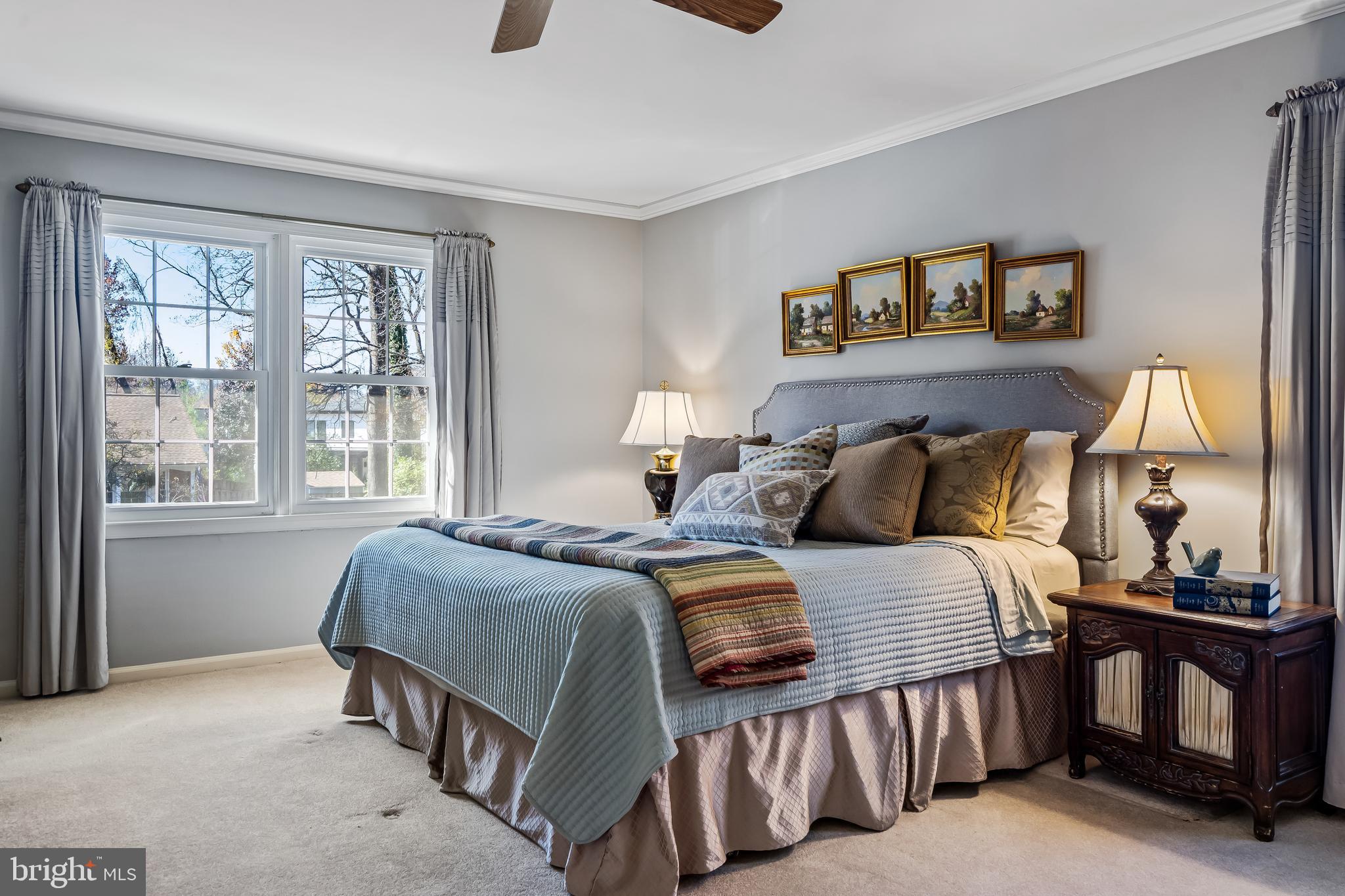 2716 Glencroft Road Vienna, VA 22181 - Photo 30 of 66 a bedroom with a bed and window