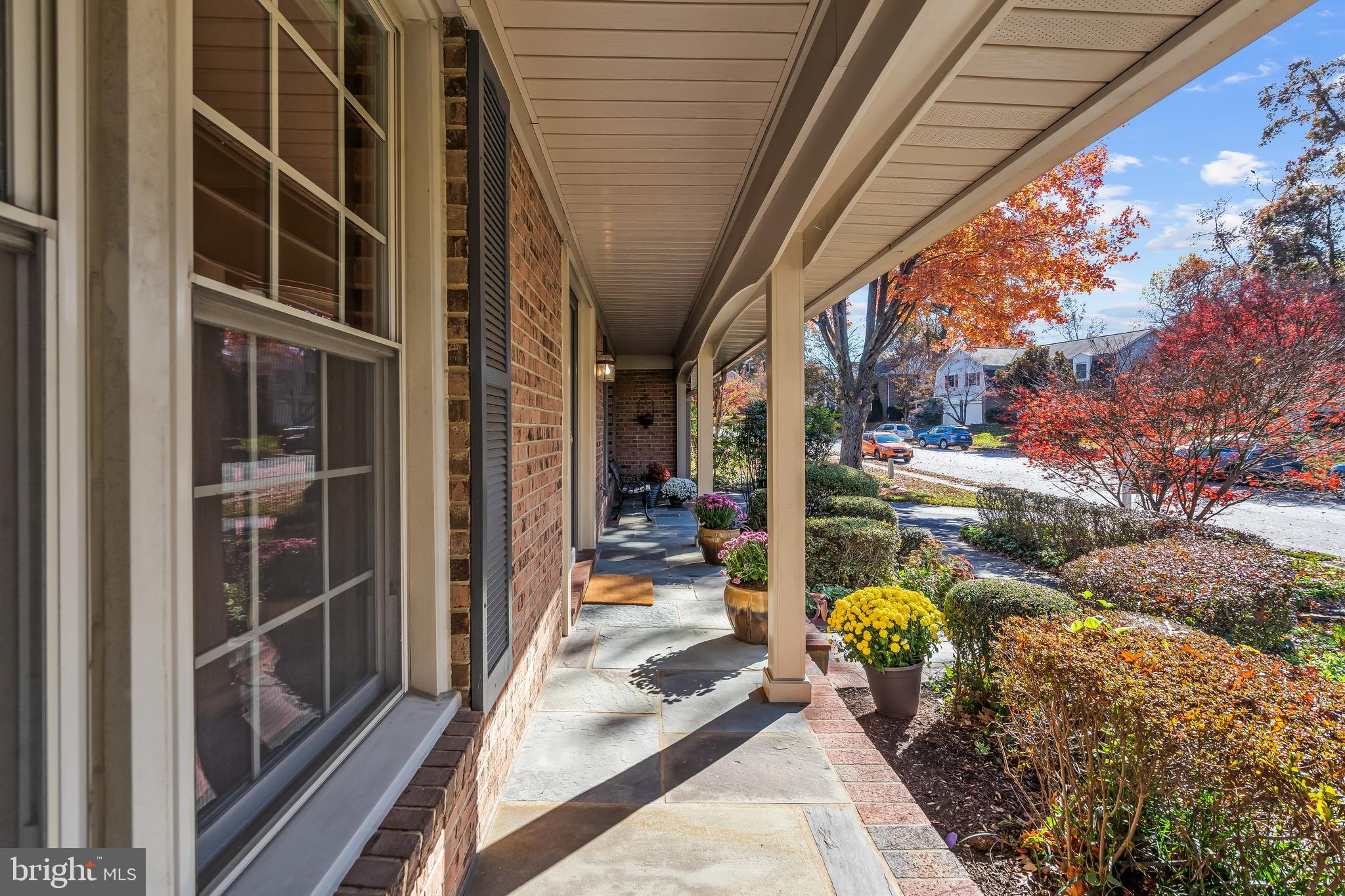 2716 Glencroft Road Vienna, VA 22181 - Photo 3 of 66 a view of a porch with chairs and floor to ceiling window