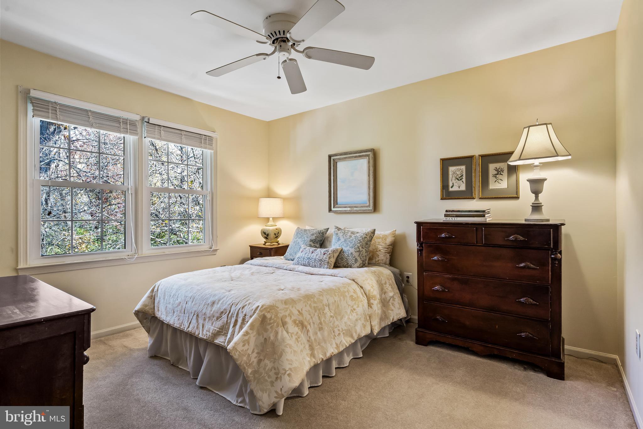 2716 Glencroft Road Vienna, VA 22181 - Photo 35 of 66 a bedroom with a bed and a window