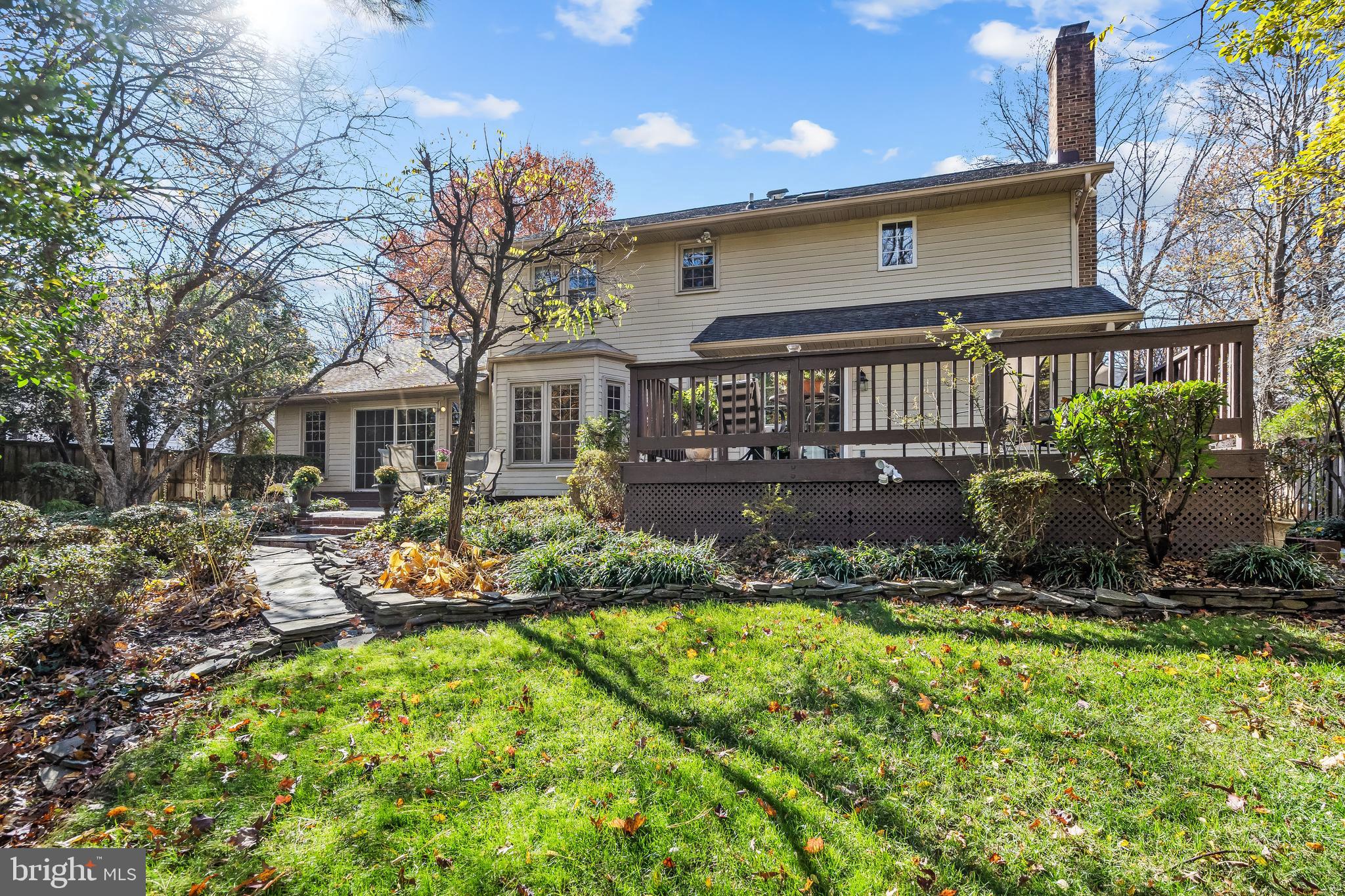 2716 Glencroft Road Vienna, VA 22181 - Photo 54 of 66 a view of a house with backyard and sitting area