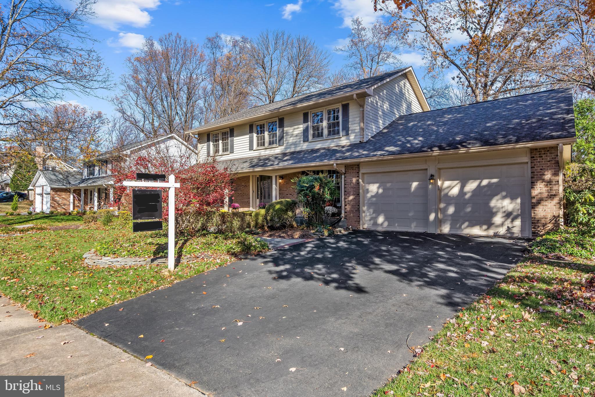 2716 Glencroft Road Vienna, VA 22181 - Photo 66 of 66 a front view of a house with garden
