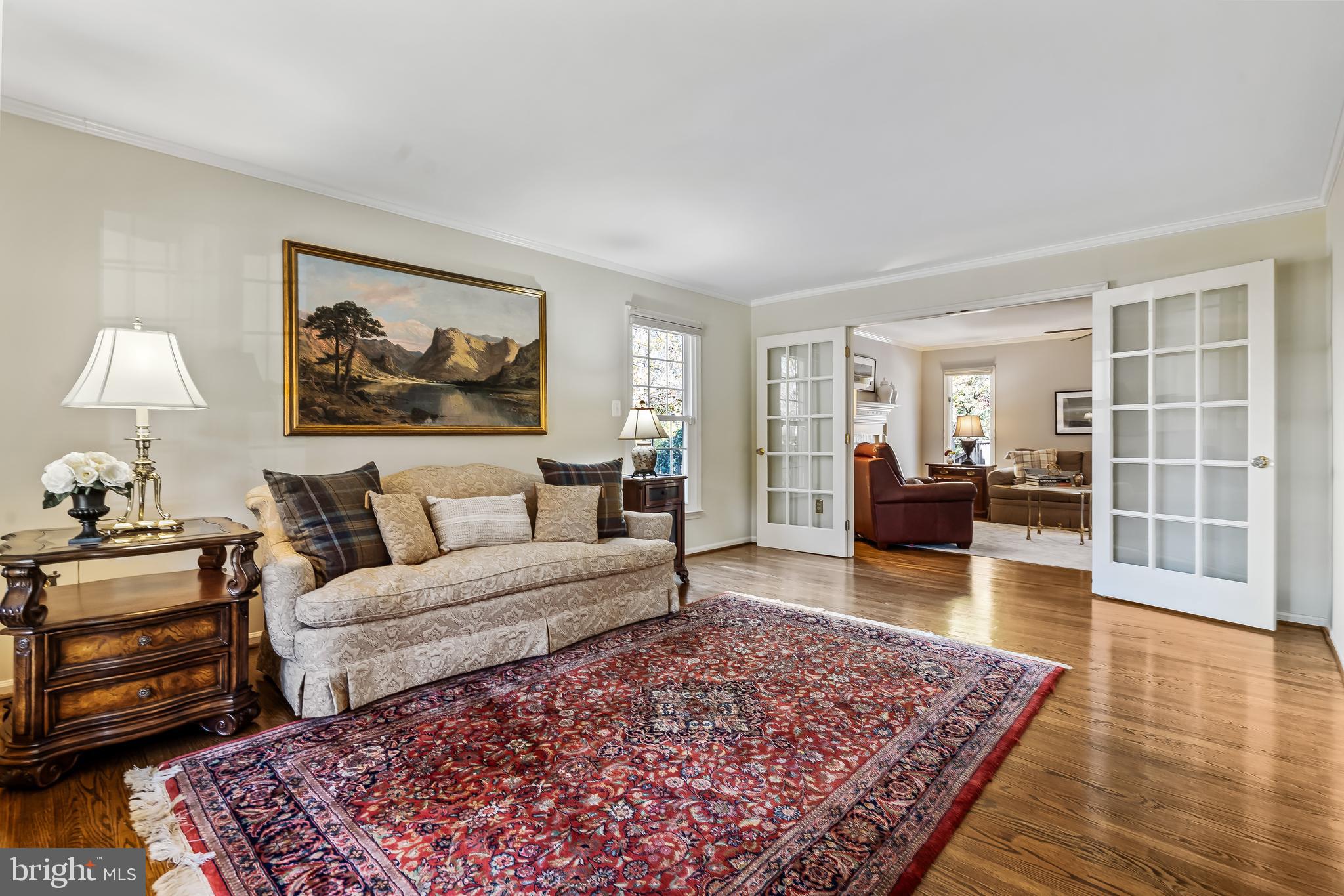 2716 Glencroft Road Vienna, VA 22181 - Photo 7 of 66 a living room with furniture and a wooden floor