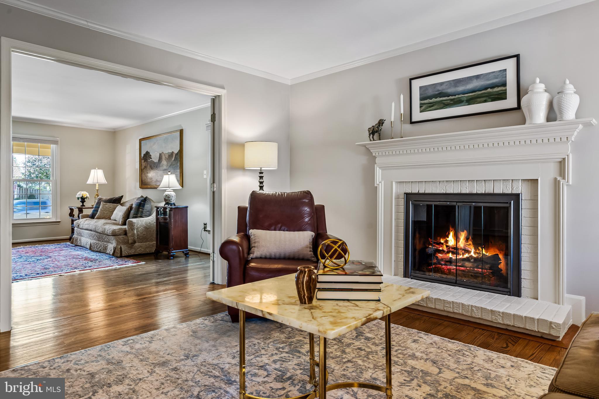 2716 Glencroft Road Vienna, VA 22181 - Photo 9 of 66 a living room with furniture and a fireplace