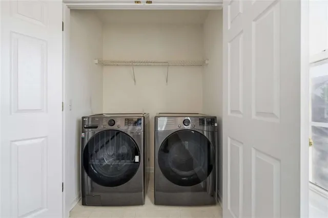 a utility room with dryer and washer