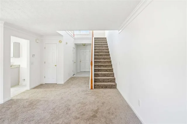 a view of entryway with stairs