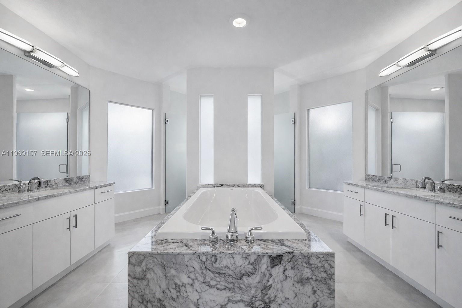 3280 Huntington Weston, FL 33332 - Photo 28 of 64 DIGITALLY ENHANCED primary bathroom with minimal upgrades