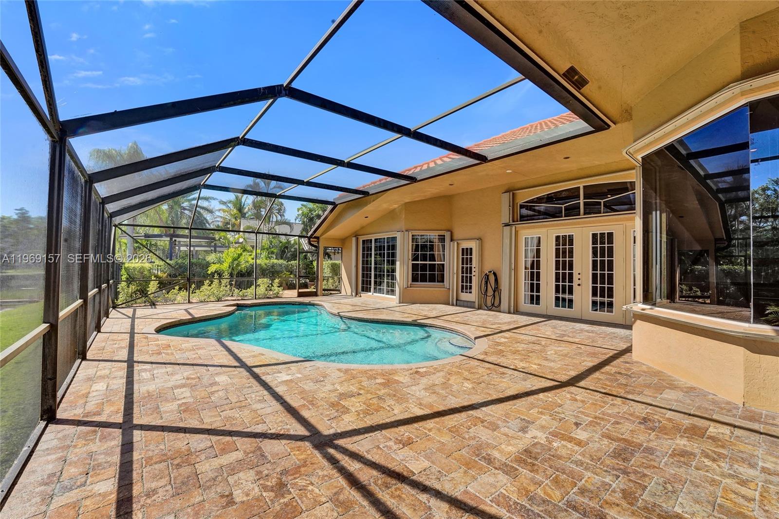 3280 Huntington Weston, FL 33332 - Photo 30 of 64 Screened-in Pool area