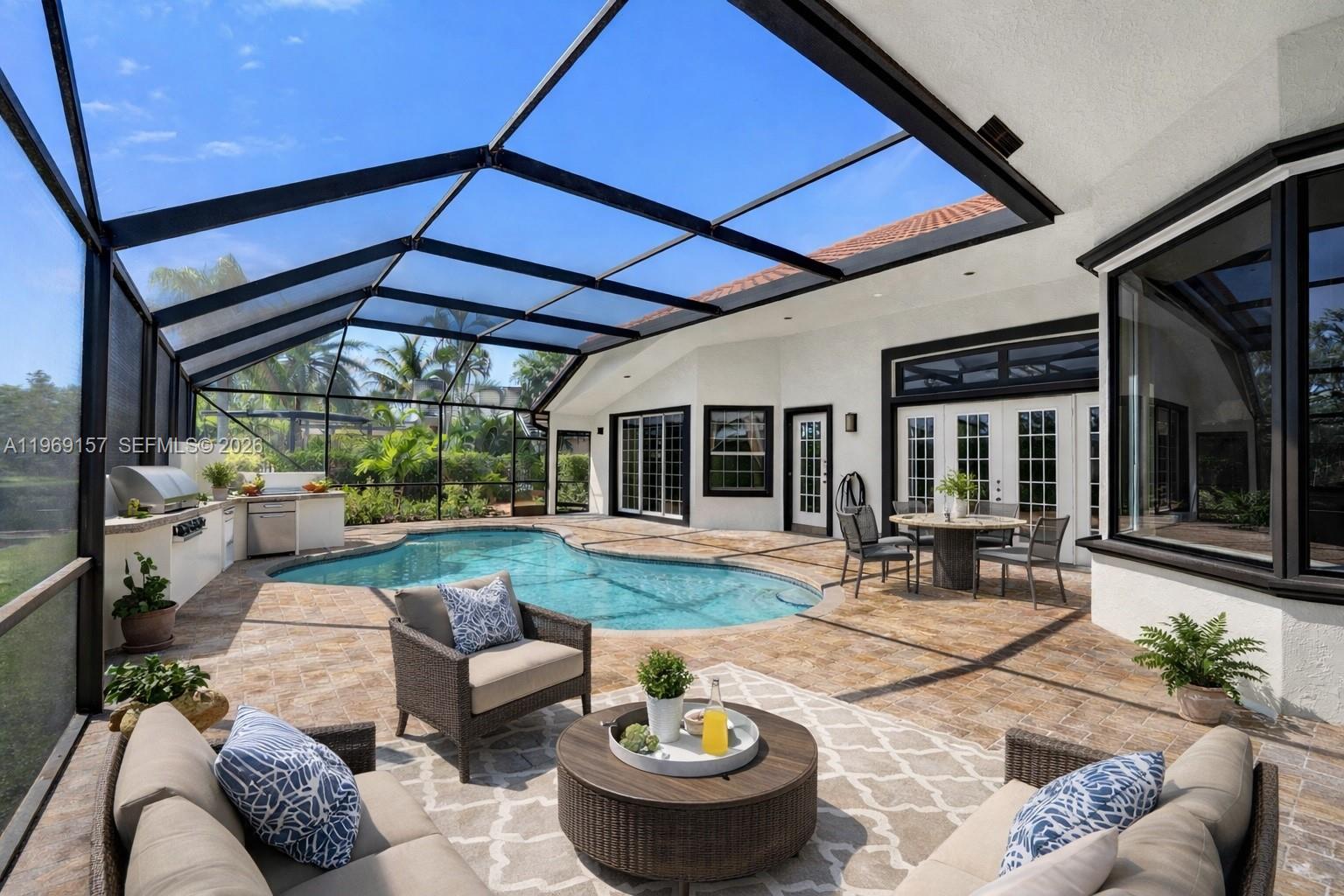 3280 Huntington Weston, FL 33332 - Photo 31 of 64 DIGITALLY ENHANCED & STAGED - house painted, new windows & comfy patio