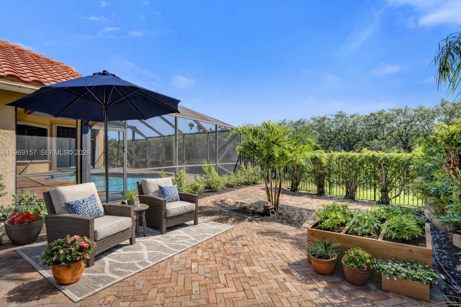 3280 Huntington Weston, FL 33332 - Photo 33 of 64 DIGITALLY STAGED with Herb garden and cozy seating