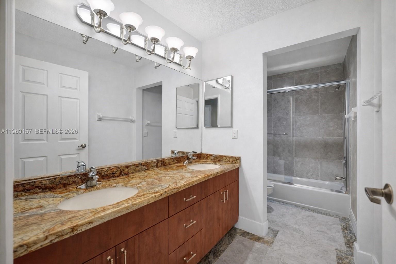 3280 Huntington Weston, FL 33332 - Photo 40 of 64 DIGITALLY ENHANCED BATHROOM - just a little white paint.
