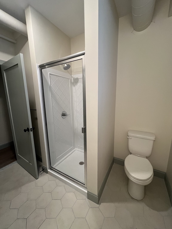 160 Seabury Street, Unit 1 Fall River, MA 02720 - Photo 10 of 13 a bathroom with a toilet and a shower